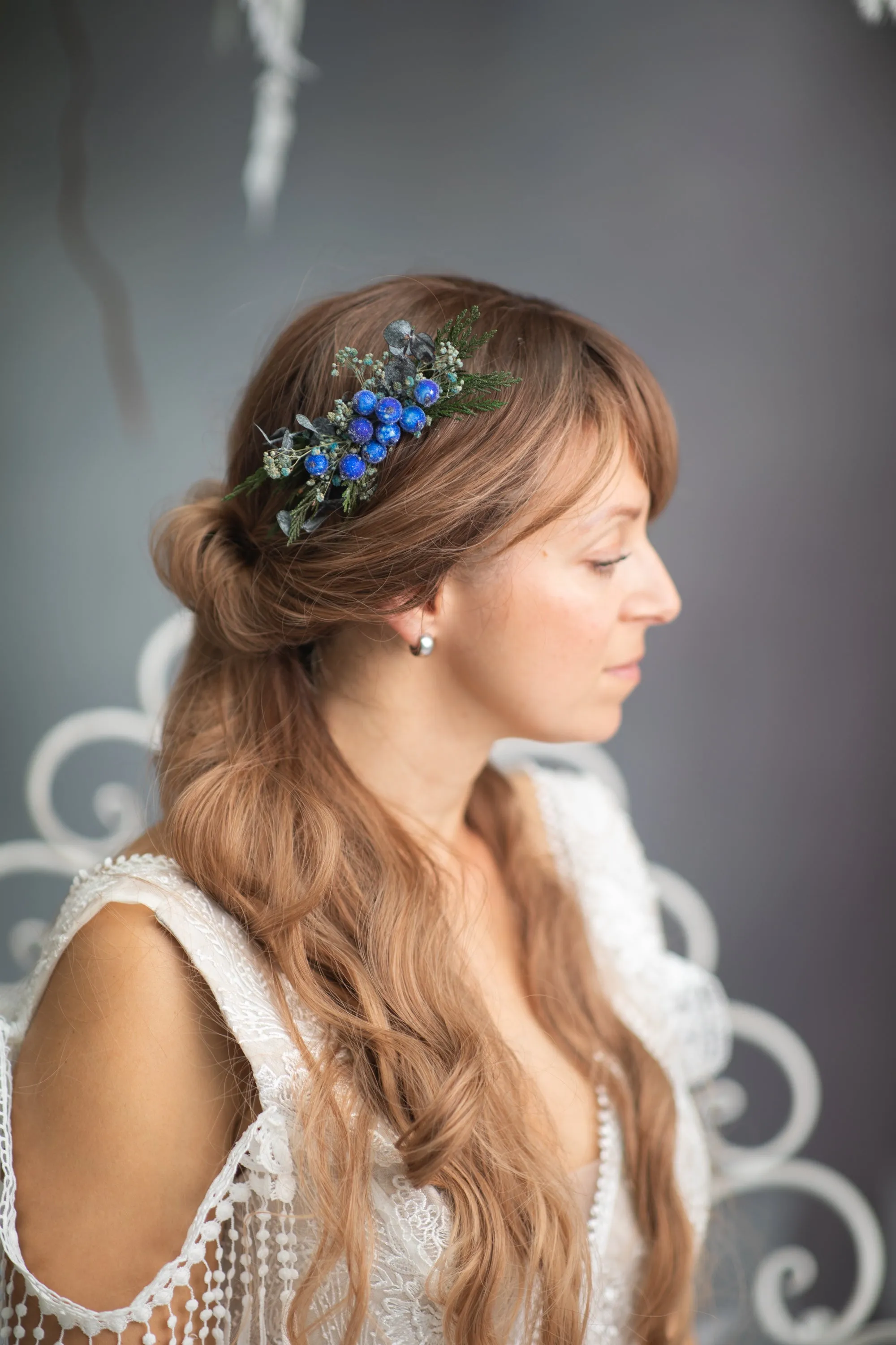 Blue winter hair comb with frozen berries