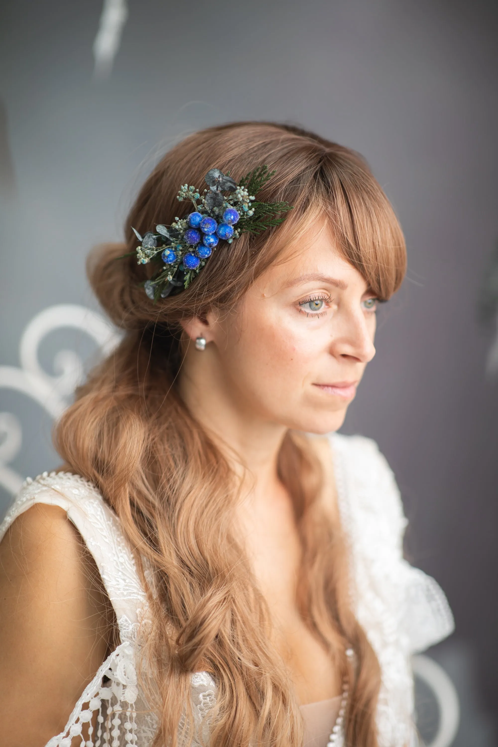 Blue winter hair comb with frozen berries