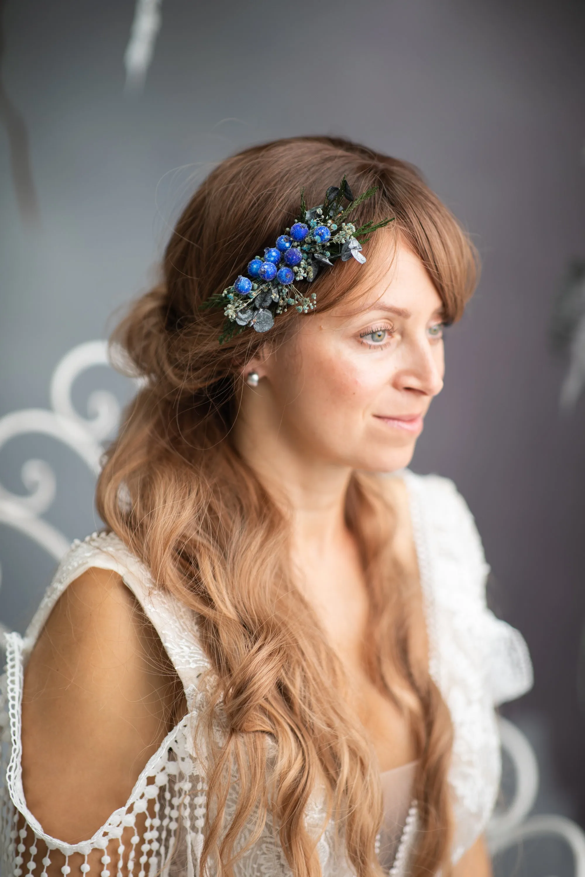 Blue winter hair comb with frozen berries