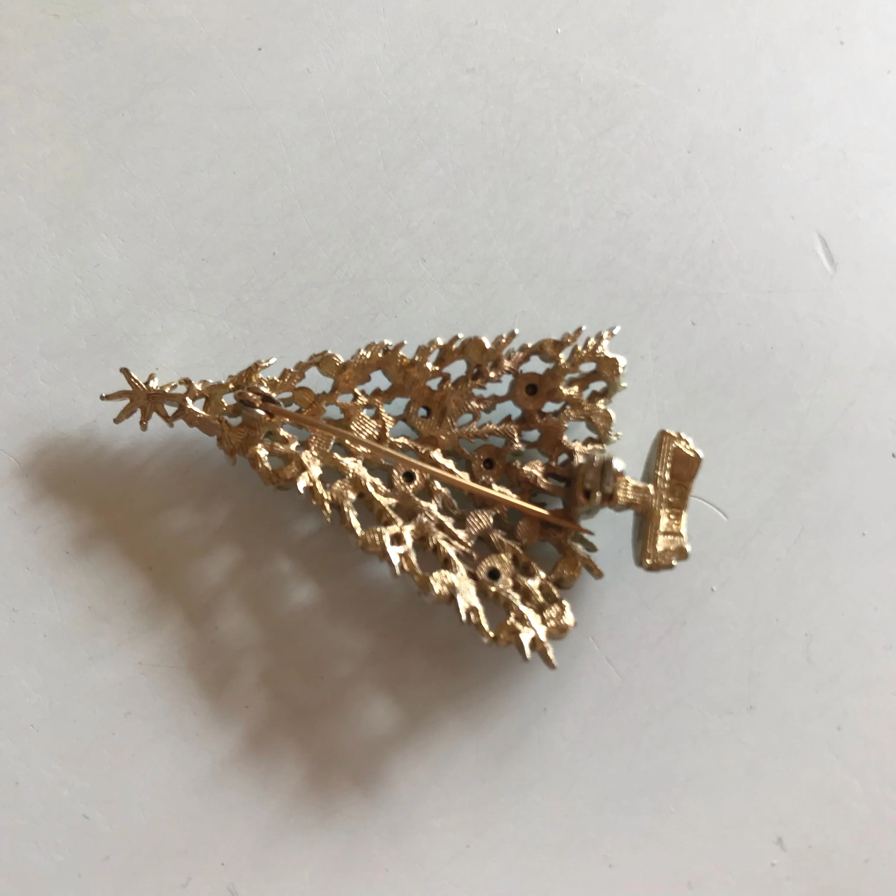 Frosted Christmas Gold Tone Metal Christmas Tree Brooch with Rhinestones circa 1960s