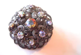 Iridescent Rhinestone Filigree Domed Brooch circa 1960s