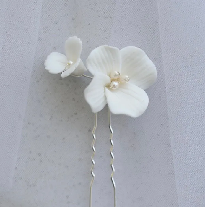 P190. clay flower hair pin