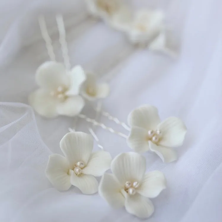 P190. clay flower hair pin