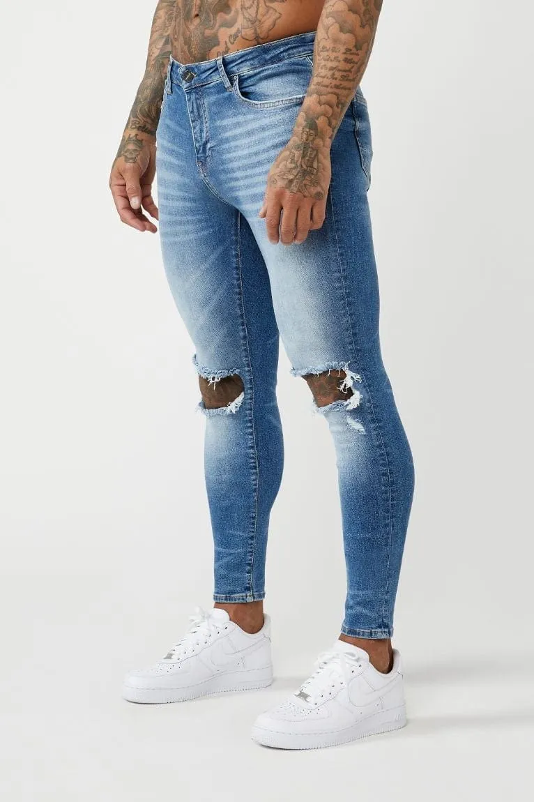 PREMIUM SKINNY FIT JEANS DESTROYED KNEE - MID BLUE WASH