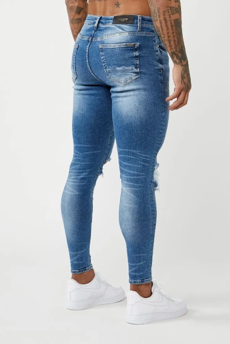 PREMIUM SKINNY FIT JEANS DESTROYED KNEE - MID BLUE WASH